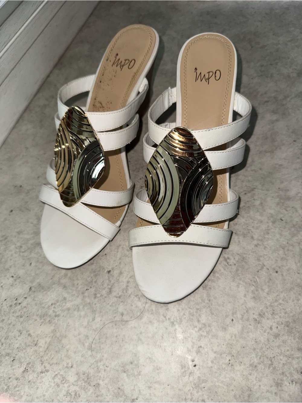 IMPO White Triple-Strap Slide Mules with Gold Medallion